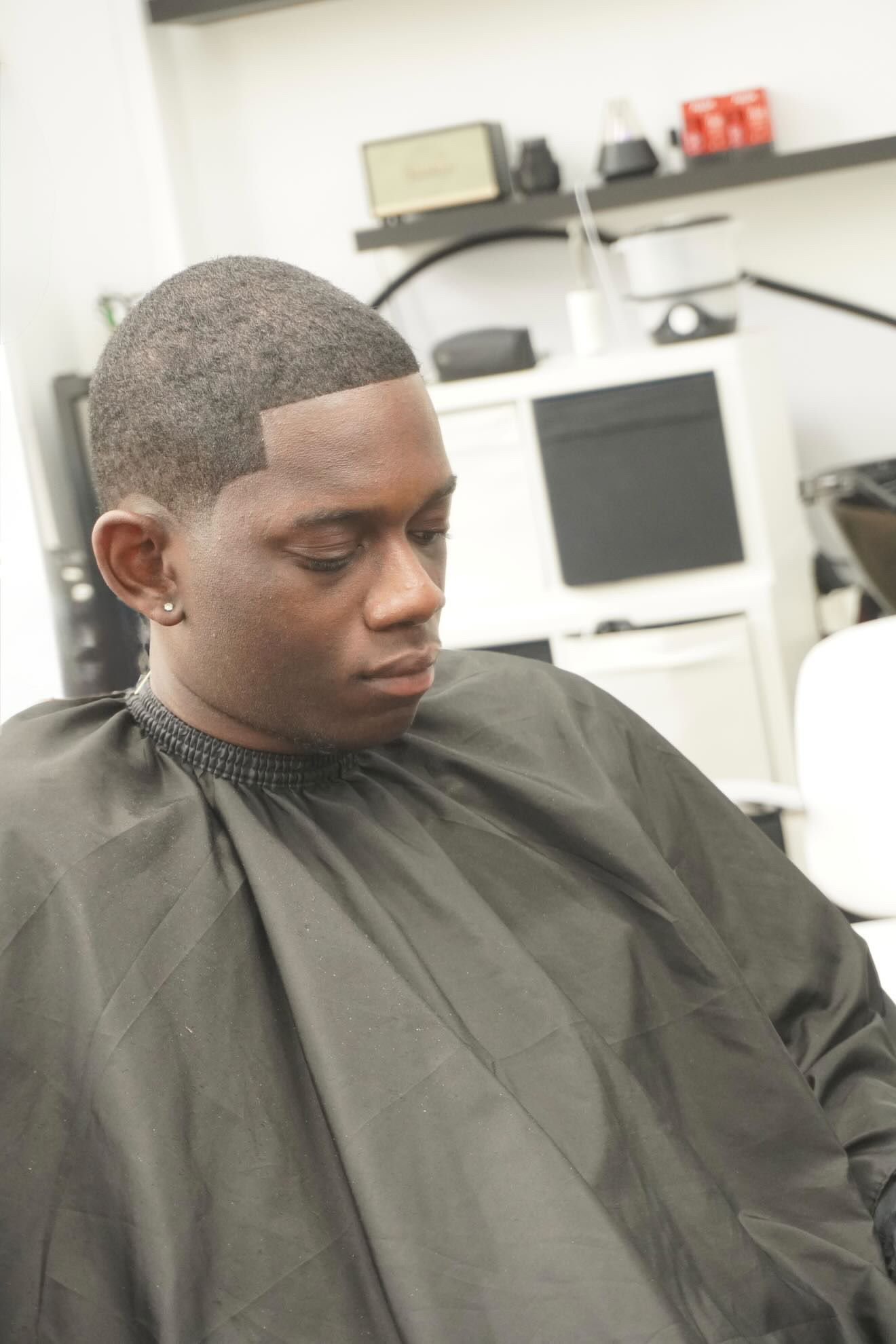 Buzz cut with sharp line up at PB Barbers